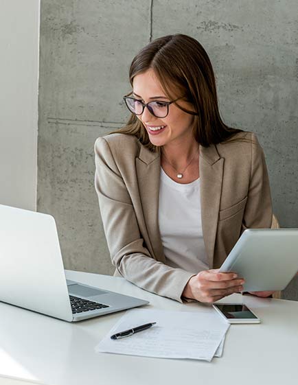 Business owner planning how to grow a business beyond a website through marketing and strategy.